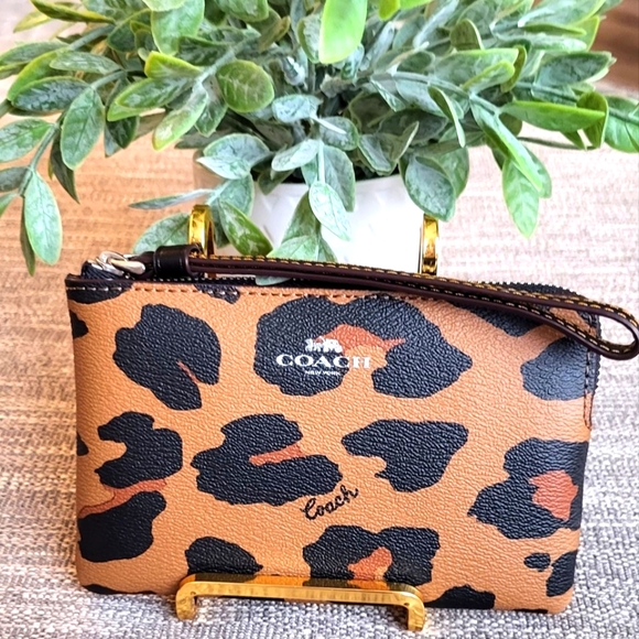 Coach Handbags - Coach Corner Zip Wristlet With Leopard Print